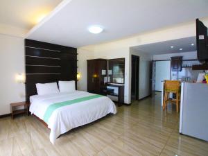 Voodi või voodid majutusasutuse Manarra Sea View Resort toas