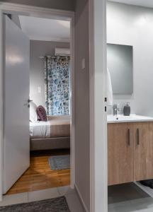 A bed or beds in a room at Absolute Athens X
