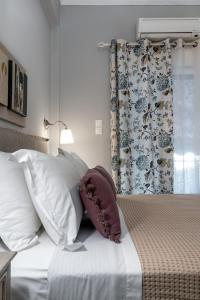 A bed or beds in a room at Absolute Athens X