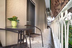 A balcony or terrace at Absolute Athens X