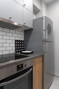 A kitchen or kitchenette at Absolute Athens X