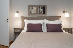 A bed or beds in a room at Absolute Athens X