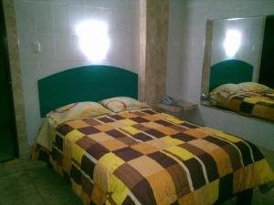 Cama o camas de una habitación en Hostal Hostello - Lima Airport