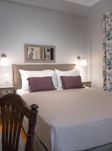 A bed or beds in a room at Absolute Athens X