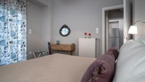 A bed or beds in a room at Absolute Athens X