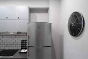 A kitchen or kitchenette at Absolute Athens X