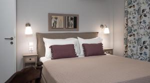 A bed or beds in a room at Absolute Athens X