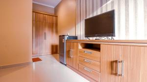 TV a/nebo společenská místnost v ubytování Mia Guest House