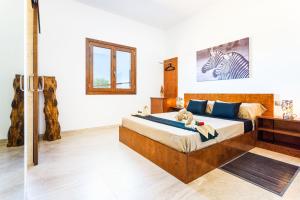 Ein Bett oder Betten in einem Zimmer der Unterkunft Luz de Luna