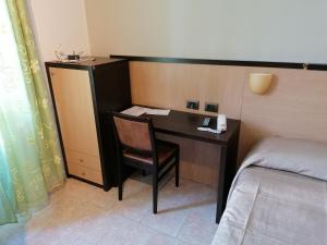 Postel nebo postele na pokoji v ubytování Hotel Cilene