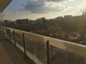 a balcony with a view of a city at T2 hyper centre bord de Loire Parking in Nantes