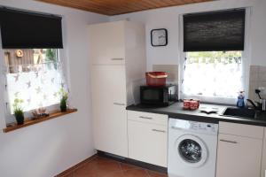 Kuchyň nebo kuchyňský kout v ubytování Ferienhaus Geli + 8 fotografií