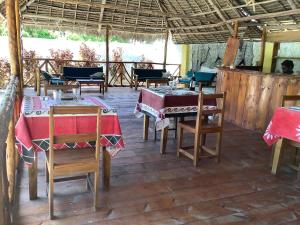 A restaurant or other place to eat at Shamba Lodge