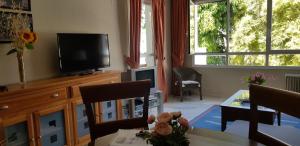 A television and/or entertainment centre at Apartamento Auténtico Playa