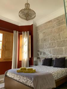 A bed or beds in a room at Albergue Gran Canaria