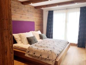 Posteľ alebo postele v izbe v ubytovaní The LODGE, Saalbach
