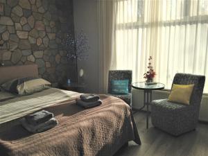 Postel nebo postele na pokoji v ubytování Westerschelde B&B
