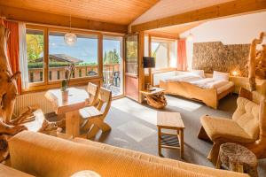 Katil atau katil-katil dalam bilik di Hotel Lindenhof by Crossworld AG