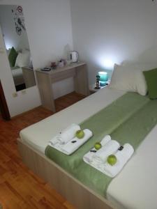 Voodi või voodid majutusasutuse The Bulevard Hotel toas