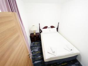 Letto o letti in una camera di Hotel Suljovic