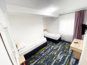 Letto o letti in una camera di Hotel Suljovic