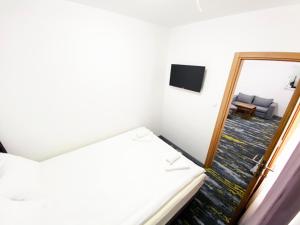 Letto o letti in una camera di Hotel Suljovic