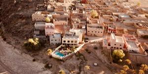 an aerial view of a village in the desert at Riad Hiba in Foum Zguid