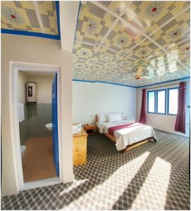 Voodi või voodid majutusasutuse Hotel Mountain Lodge Skardu toas