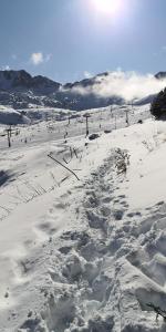 Lux Aigle "Acceso directo a pistas" að vetri til