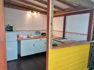 Cucina o angolo cottura di Le Parc aux Orchidées