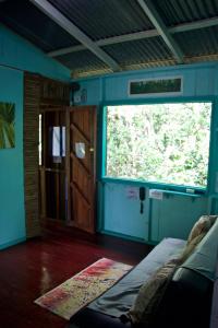A kitchen or kitchenette at Hidden Jungle Beach House