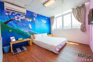 Postel nebo postele na pokoji v ubytování Liouciou Good Homestay