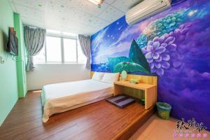 Postel nebo postele na pokoji v ubytování Liouciou Good Homestay