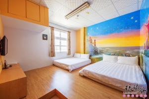 Postel nebo postele na pokoji v ubytování Liouciou Good Homestay