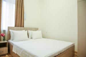 Ένα ή περισσότερα κρεβάτια σε δωμάτιο στο Alba Hotel Yerevan