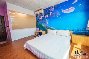 Postel nebo postele na pokoji v ubytování Liouciou Good Homestay