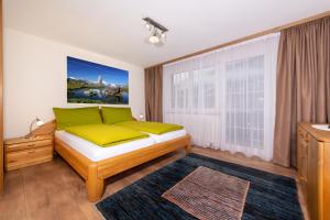 Postel nebo postele na pokoji v ubytování Apartment Aura