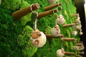 a group of ornaments hanging on a wall at Hotel Rovanada Wellness & BergNatur in Vals