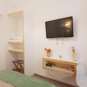 TV a/nebo společenská místnost v ubytování ControVento Apartament