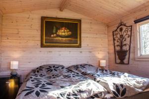 Letto o letti in una camera di Limfjords hytter
