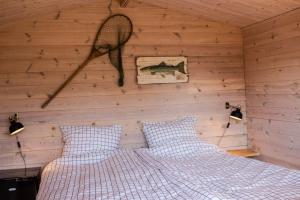 Letto o letti in una camera di Limfjords hytter