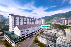 an aerial view of a city with buildings at Nova Highlands Hotel in Cameron Highlands