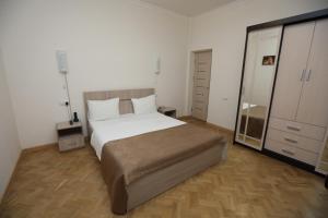 Ένα ή περισσότερα κρεβάτια σε δωμάτιο στο Alba Hotel Yerevan