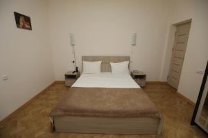 Ένα ή περισσότερα κρεβάτια σε δωμάτιο στο Alba Hotel Yerevan