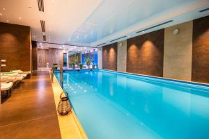 Swimming pool sa o malapit sa A Modern Suite Close to Gondola Ski Lift