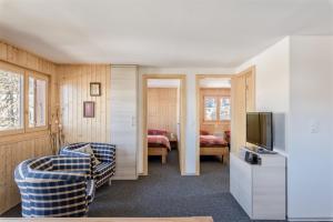 Postel nebo postele na pokoji v ubytování Chalet Krokus + 2 fotografie