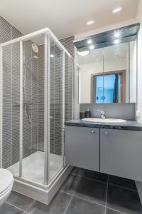 Koupelna v ubytování Appartement met zwembad in Neoportus Nieuwpoort