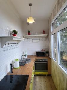 Virtuvė arba virtuvėlė apgyvendinimo įstaigoje Lux Apartament ,,Górskie Widoki '' Karpacz Mountain Views