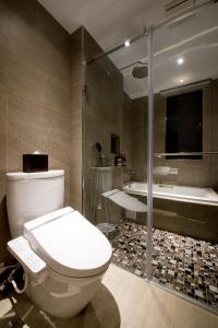 Koupelna v ubytování He-Jia Hotel