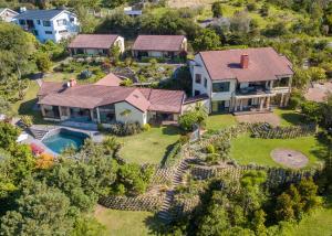 an aerial view of a house with a swimming pool at Double Dutch B & B in Knysna
